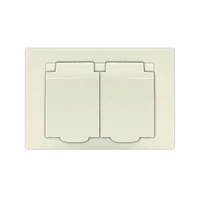Розетка 2-м СП Афина 16А IP20 с заземл. c крышкой в сборе сл. кость (ivory) Universal A0031-I